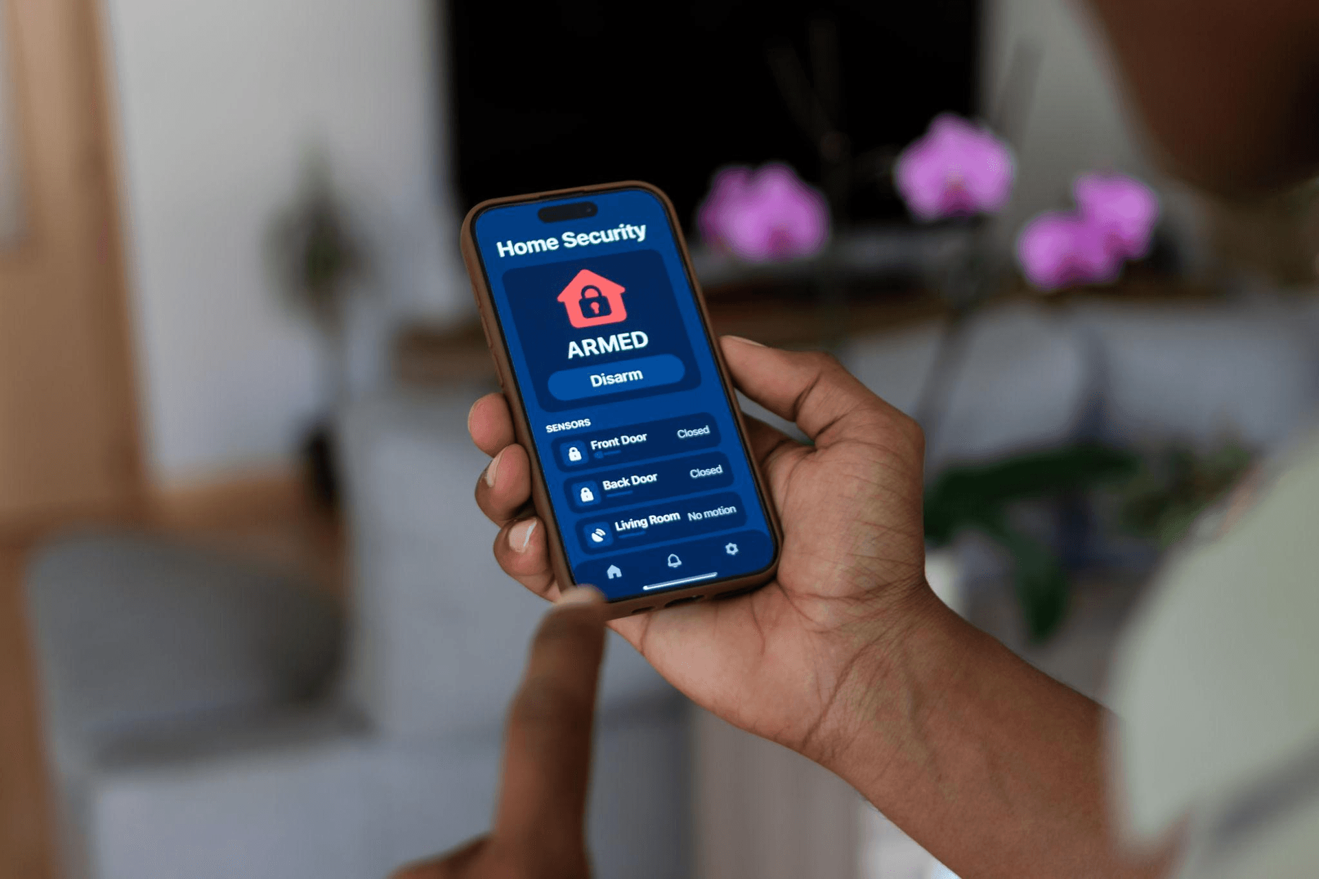 Home security system armed and active on smartphone app